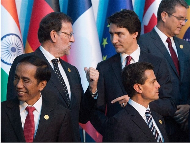 Đi công du tới đâu, Thủ tướng Justin Trudeau cũng phong thái ngời ngời, thu hút mọi ánh nhìn từ mọi người - Ảnh 3.
